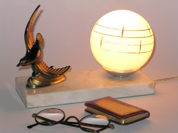 French art deco bird lamp on a marble plinth