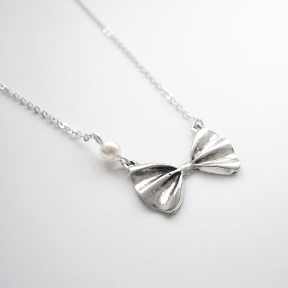 Cute silver bow necklace with pearl