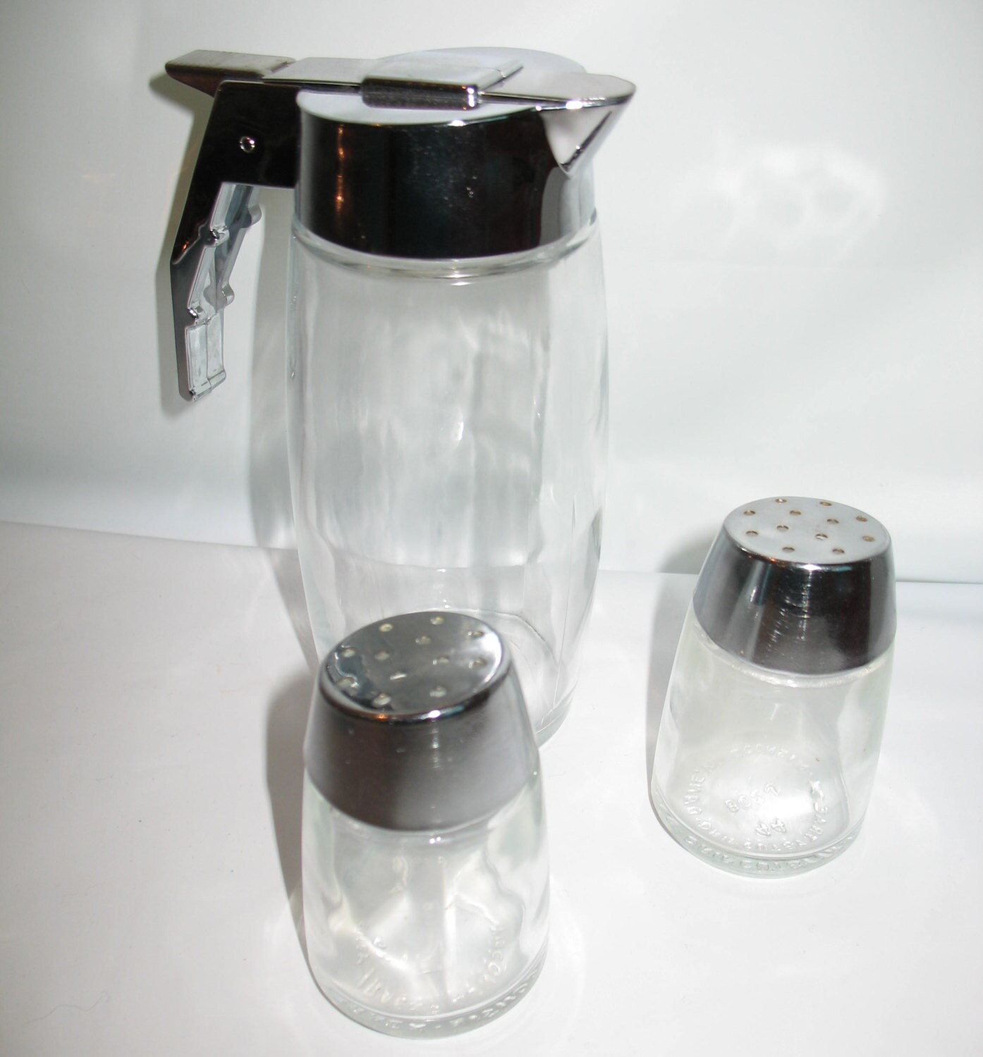 Salt Pepper Shakers and Dispenser in Glass & Chrome