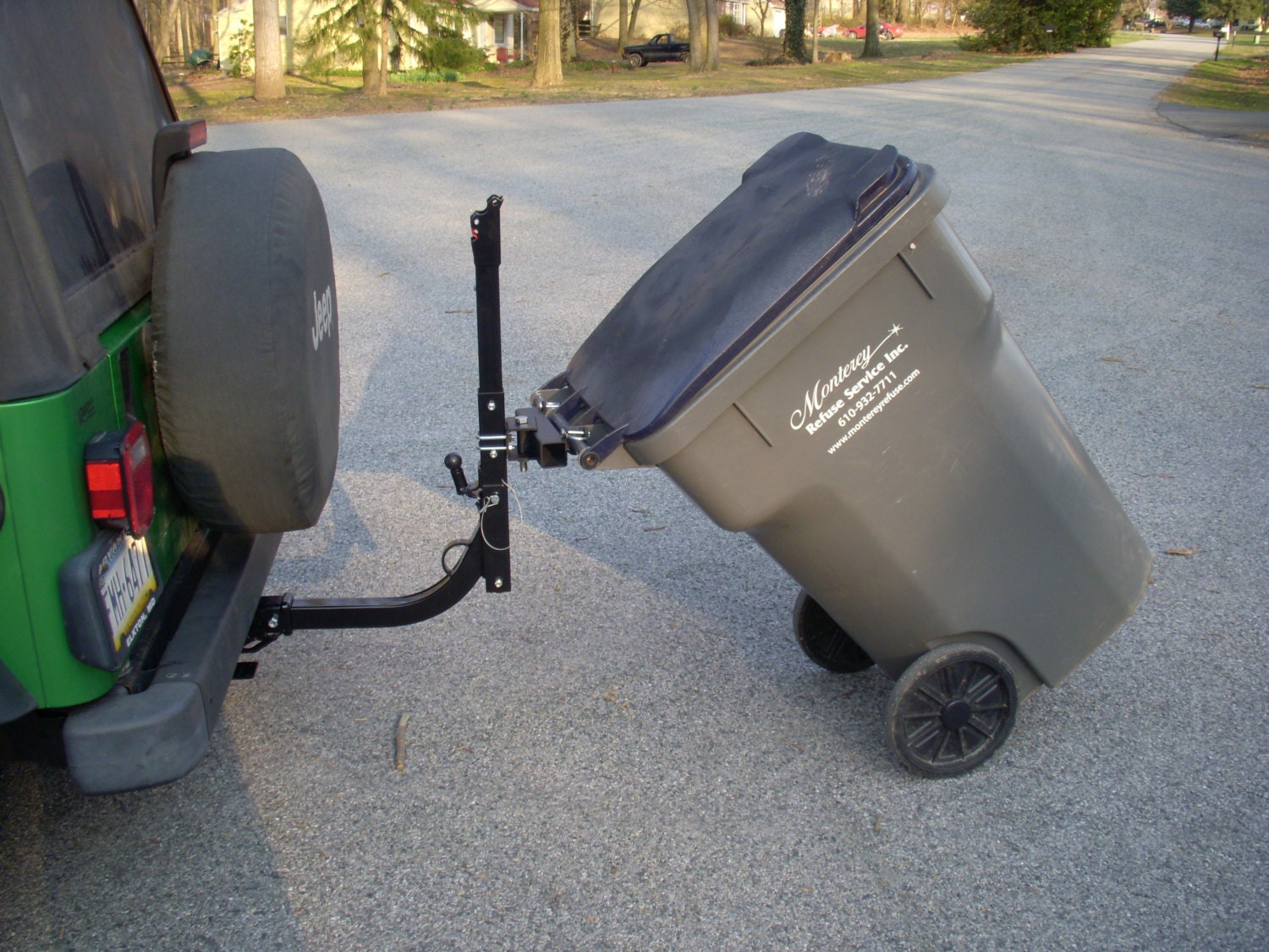 Home made steel Trash Can Hauler. Attaches to any bike rack