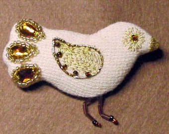 Golden-cream bird of happiness