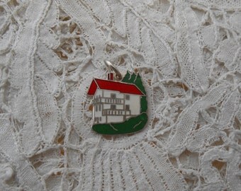 Alpine chalet enamel charm 1930