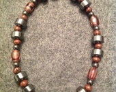 Hematite and stone beads. Fits most wrists. (Male)