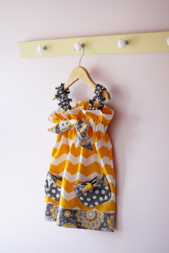 Yellow chevron sun dress with pockets and bow