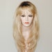 long layered blonde wig/ dark brown root