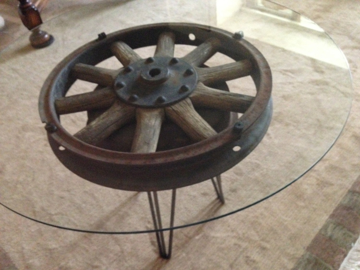Antique wooden 18 inch truck wheel accent table with 30 diameter glass top