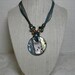Blue, Green, and Silver Striped Glass Pendant Necklace on a Turquoise Ribbon And Cord Choker