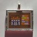 Postage Stamp Pendant - Encouraging Children to Read