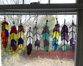 another flock Indian Chief Eagle Feather stained glass with Beads in purples blues etc