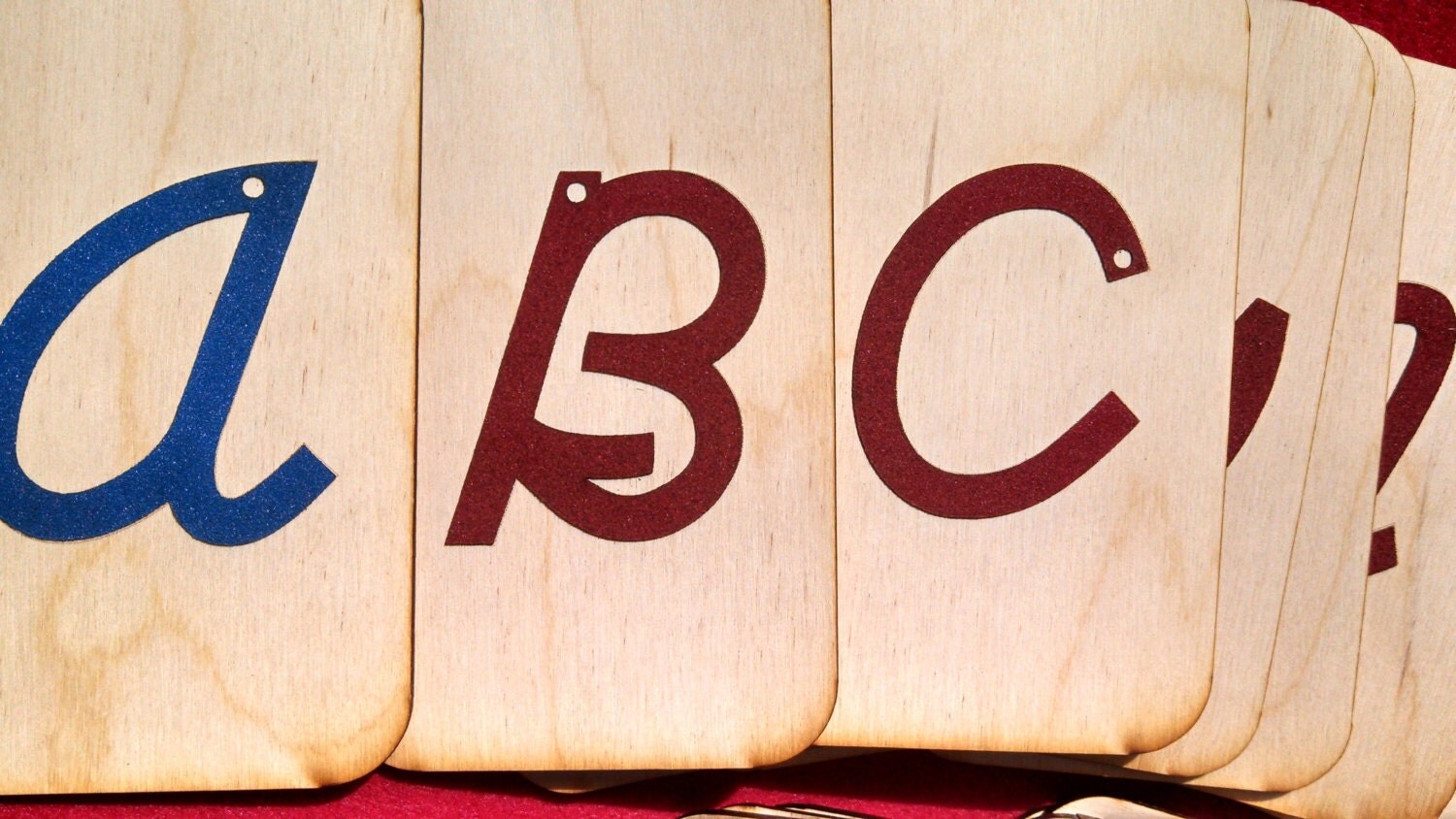 uppercase cursive sandpaper letters on 3x5 birch