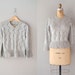 pointelle sweater / metallic silver sweater / Silver Peplum sweater