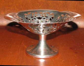 Antique silver compote decorated with grapes and vines