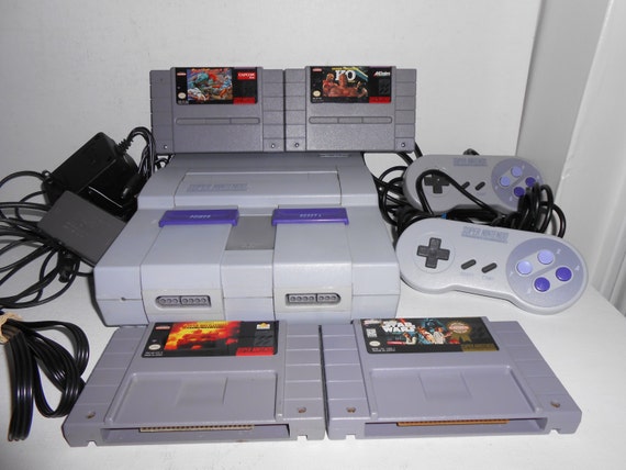 1990s Super Nintendo Entertainment System with Cords Plugs