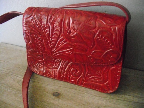 red tooled leather purse