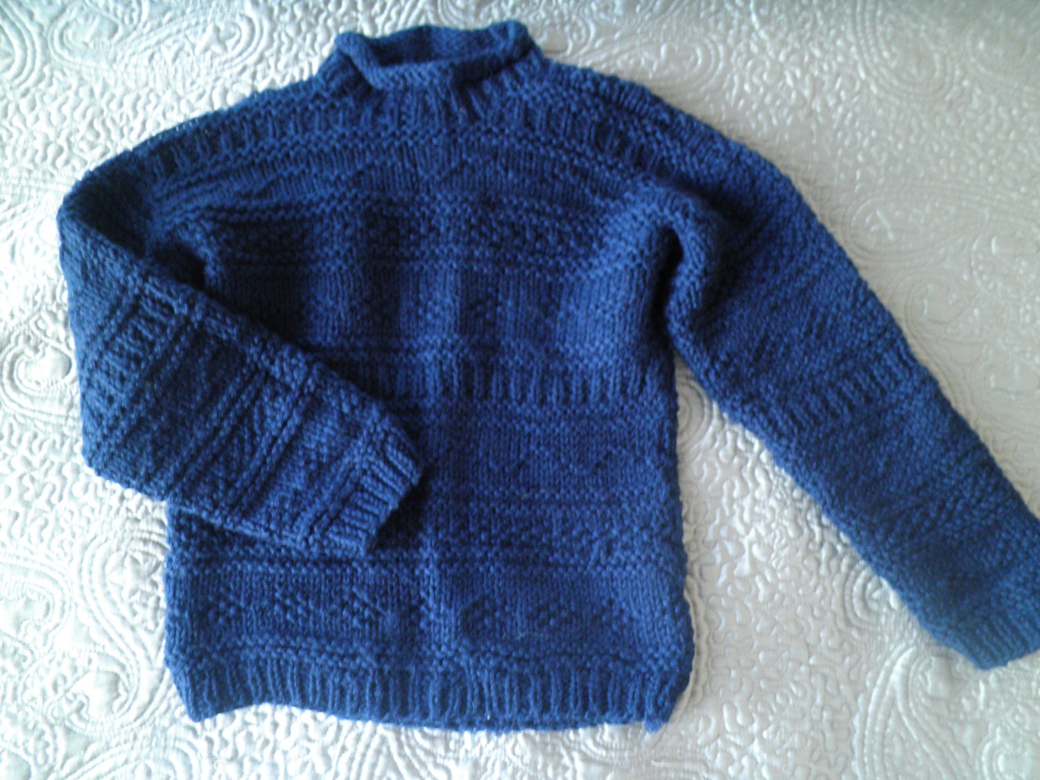 Traditional gansey sweater but made in acrylic for softness