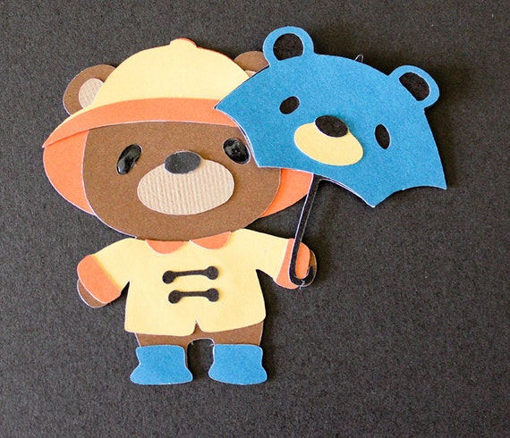 teddy bear with raincoat