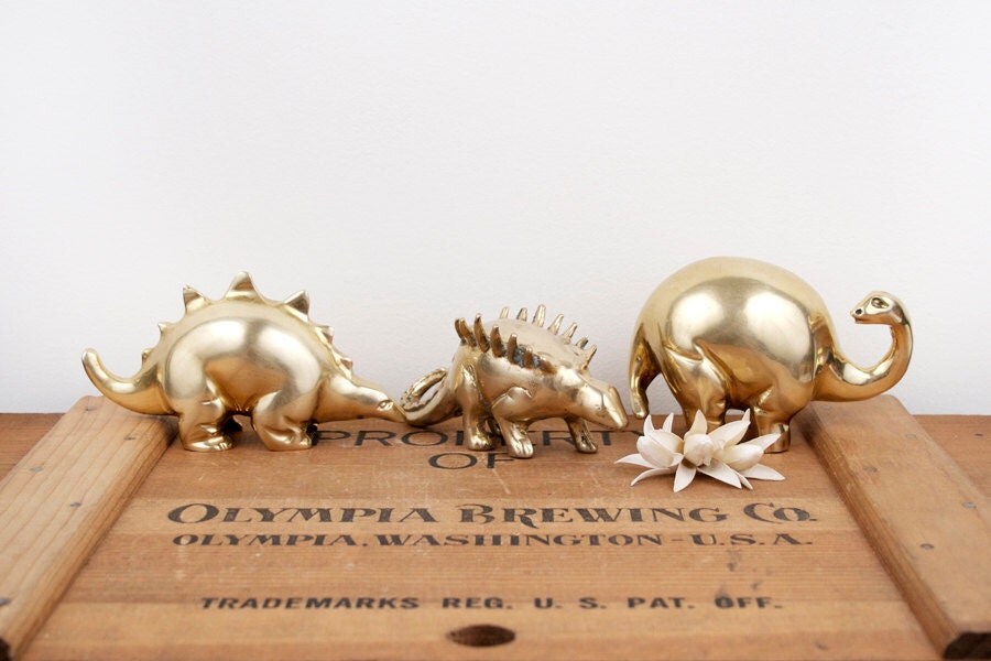 brass dinosaur figurine