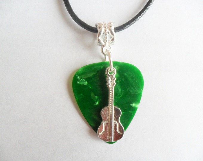 Green guitar pick necklace with guitar charm that is adjustable from 18" to 20"