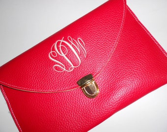 red and white clutch bag