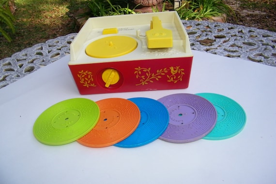 fisher price record player with 5 records