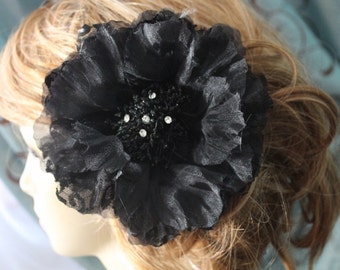 Items similar to Bridal feather flower head piece on Etsy