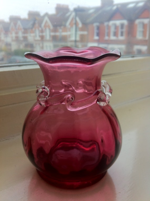 English vintage cranberry glass vase with fluted rim and clear