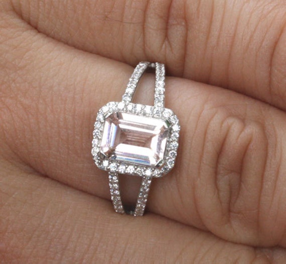 Split shank emerald cut diamond engagement rings
