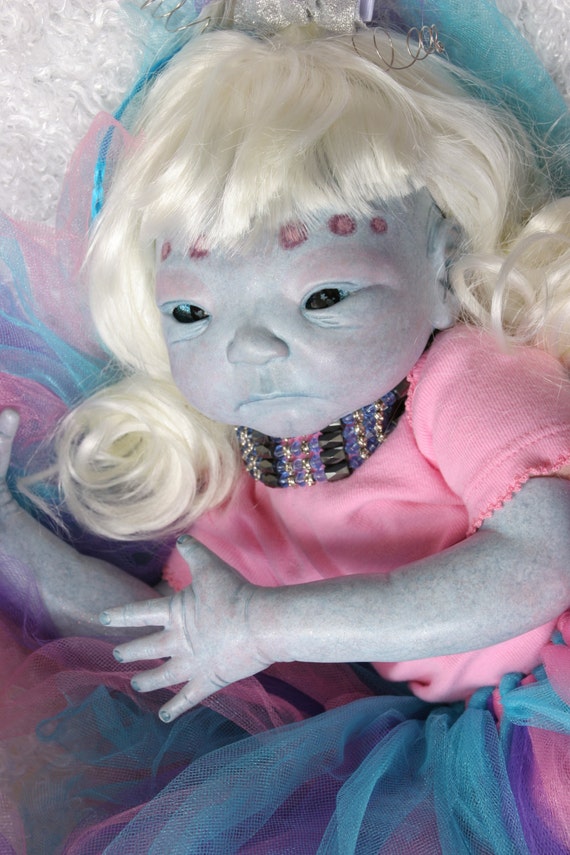 lifelike alien doll