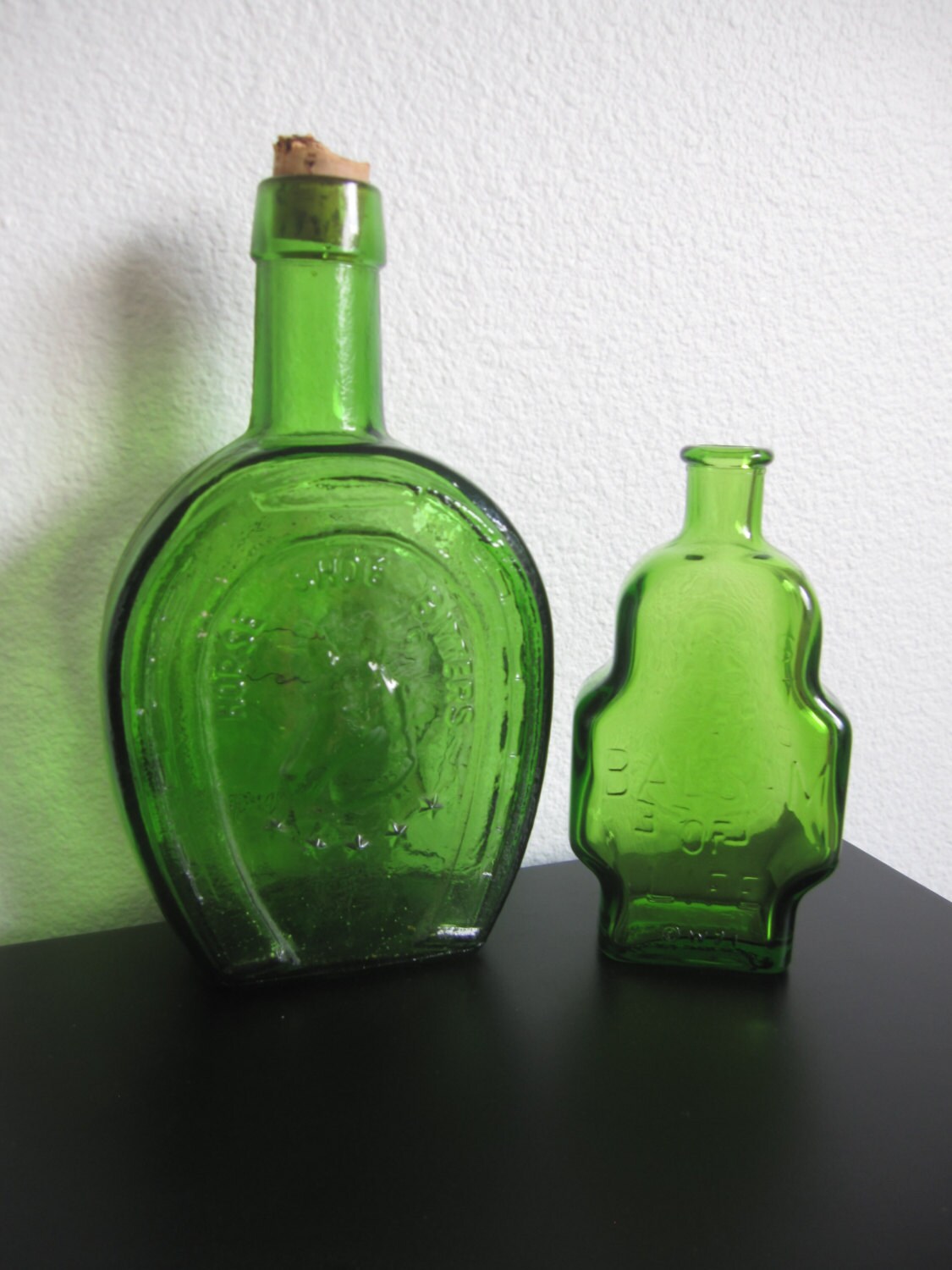 Vintage Horse Shoe Bitters and Basalm of Life Green Glass