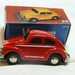 Collectors Tin Toy - Frictioned Powered Red VW Beetle