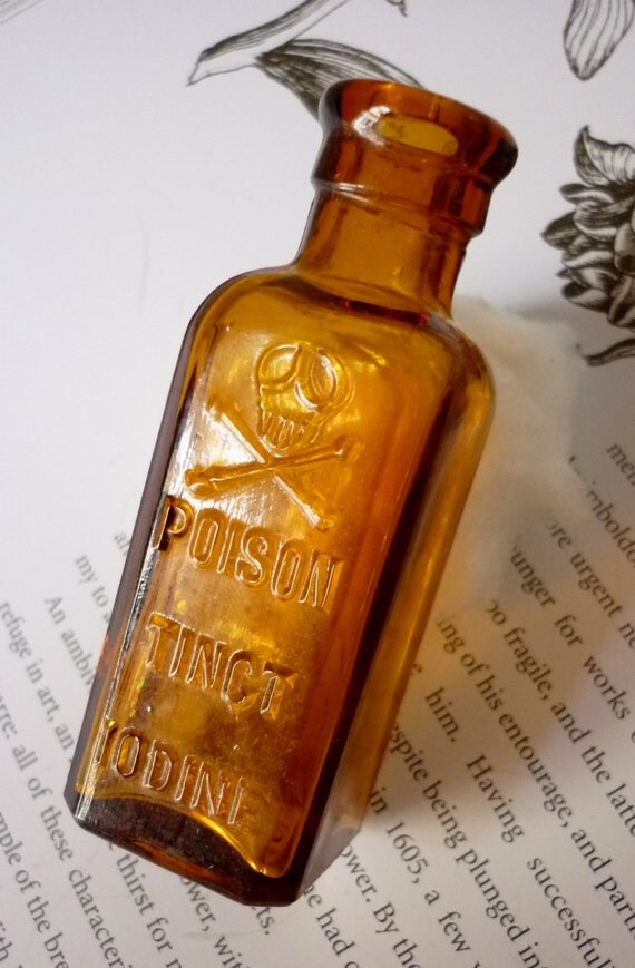 Antique Skull and Cross Bones Poison Bottle