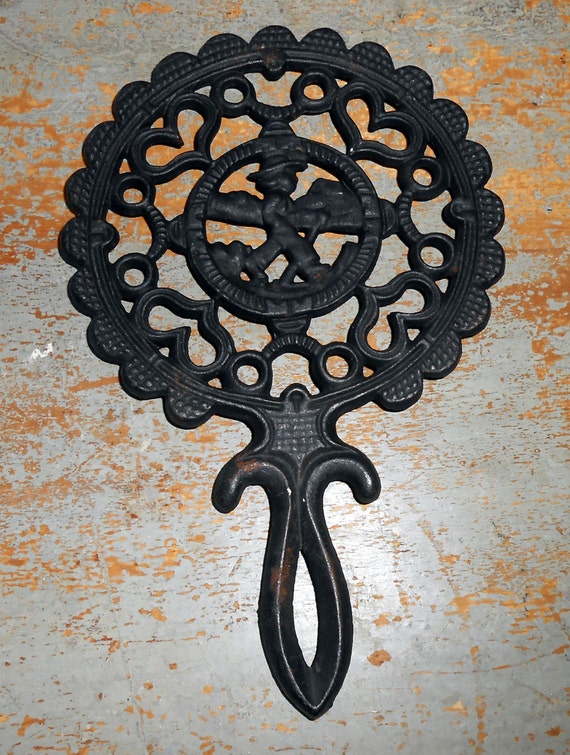 Vintage Trivet Cast Iron Black Hearts Round Handle by TheBackShak