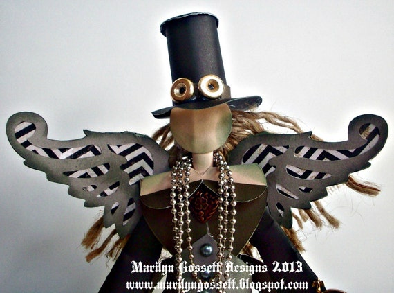 9" tall Steampunk style Angel, designed and handmade by shop owner.  Paper sculpture.