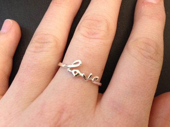 Items similar to Sterling Silver Love Word Ring on Etsy