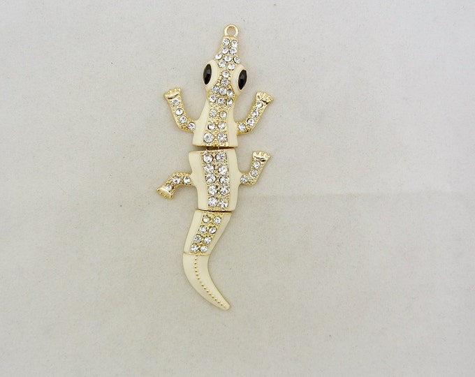 Gold-tone Flexible Alligator Pendant with Rhinestones and Creme Epoxy