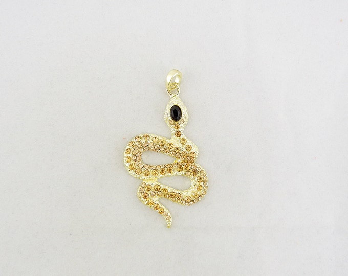 Gold tone Snake Pendant with Topaz Rhinestones Black Eye Accent