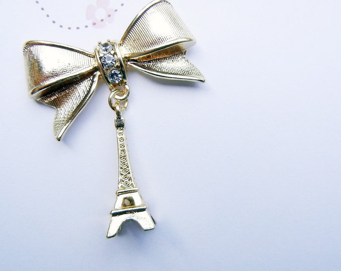 Gold-tone Bow and Eiffel Tower Pendant Rhinestones