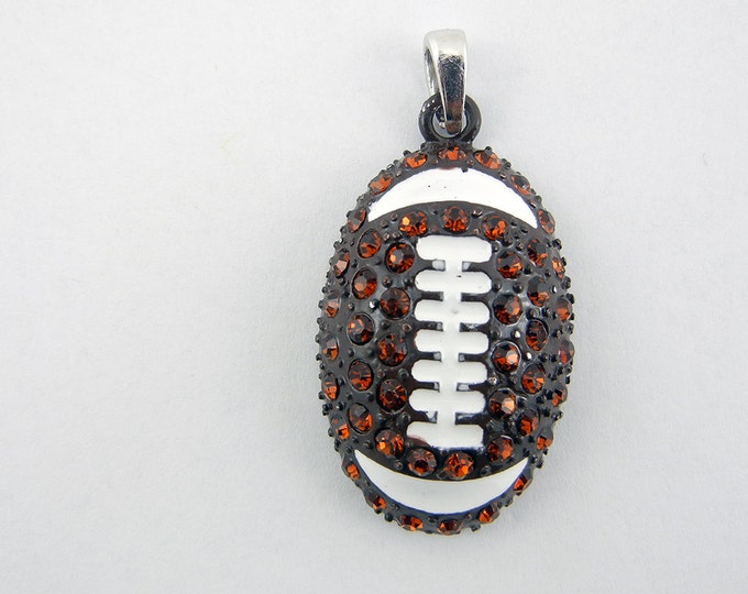 Black and White Epoxy Topaz Rhinestone Football Pendant SIlver-tone Base