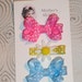 Delightful Dots and a Daisy on 2 Tiny Bows and a Clip. Ready to Ship.