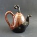 Handmade, wheel thrown and manipulated ceramic teapot