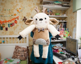 Deer with the hand embroidered flowered face . Soft art toy by Wassupbrothers. MADE TO ORDER