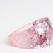bright pink round faceted eco resin ring featuring silver leaf flakes - size 6.5