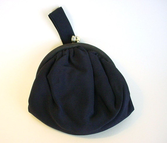 small navy blue clutch bag