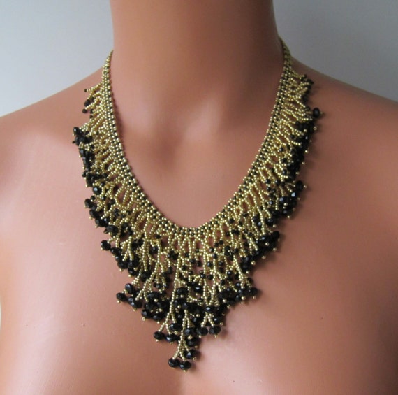Gold and black necklace. Japanese seed beads and Czech fire