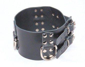 Wide, about 3.15" (8 cm) handmade black leather collar with three halfrings