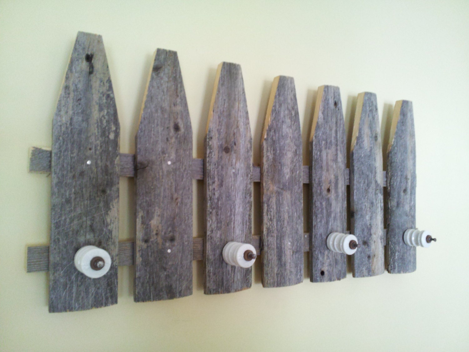 Rustic picket fence coat rack