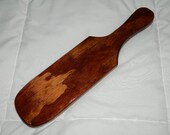 Pine adult spanking paddle.
