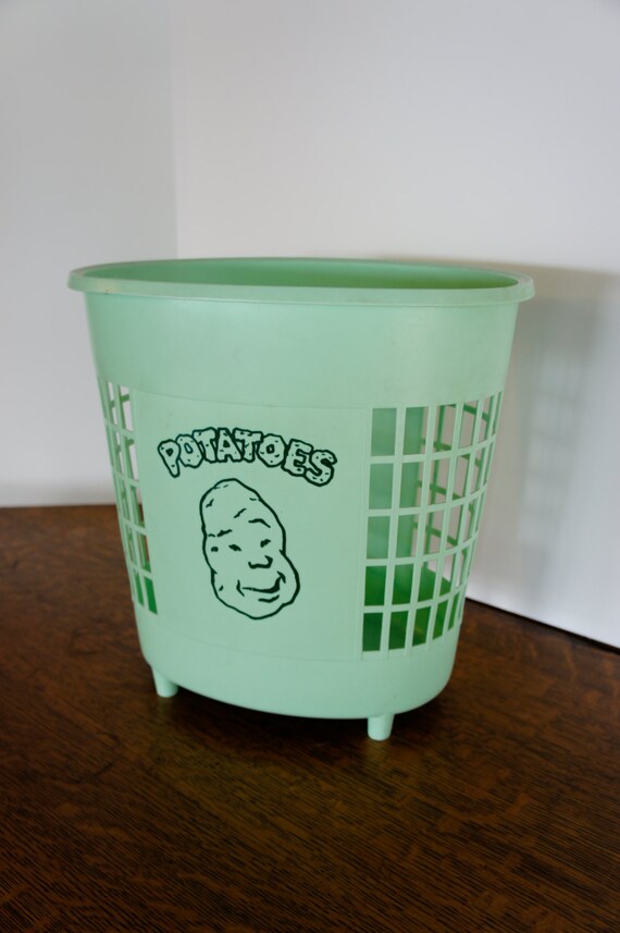 vintage mint green plastic weave potato bin or trash can