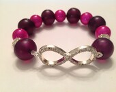 Rhinestone 'Infinity' Bracelet with Iridescent Pink Beads. Fits Most Wrists.