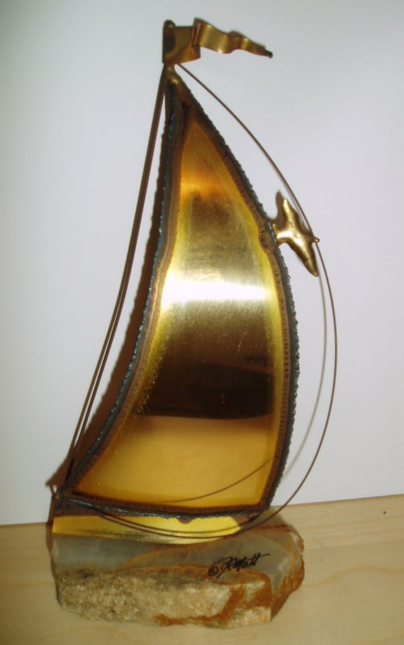 brass mid century sailboat